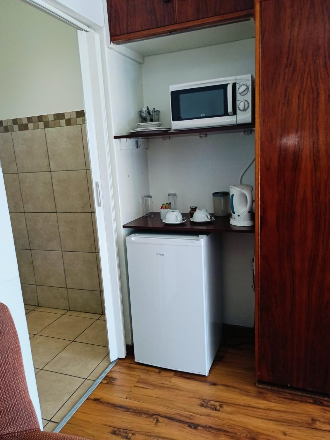 21 On Coetzee Guest House Блумфонтейн Номер фото